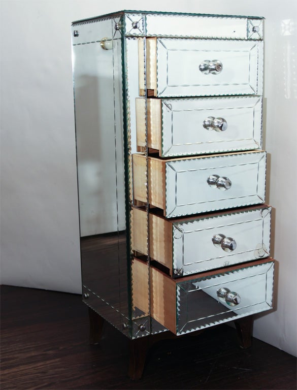 Custom 5-Drawer pie crust mirrored chest with ebonized legs. Customization is  available in different sizes finishes, and hardware.