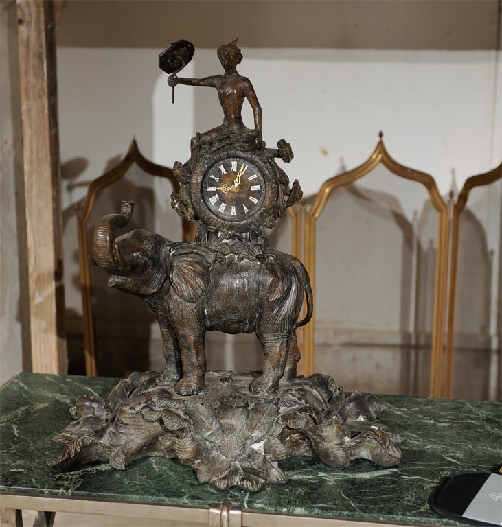 Whimsical metal figural Clock...Monkey w/ parasol riding Elephant; early to mid-20th c.