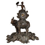 Whimsical metal figural Clock, Monkey w/ parasol riding Elephant