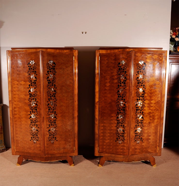 20th Century Pair of small French Art Moderne mahogany and marquetry armoires For Sale