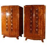 Pair of small French Art Moderne mahogany and marquetry armoires