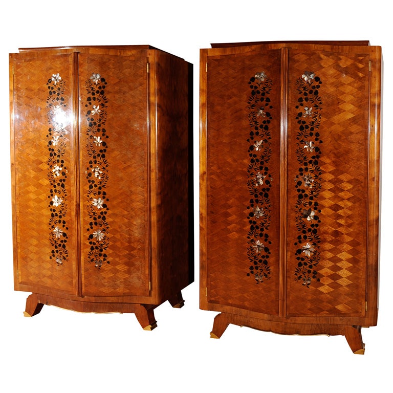 Pair of small French Art Moderne mahogany and marquetry armoires For Sale