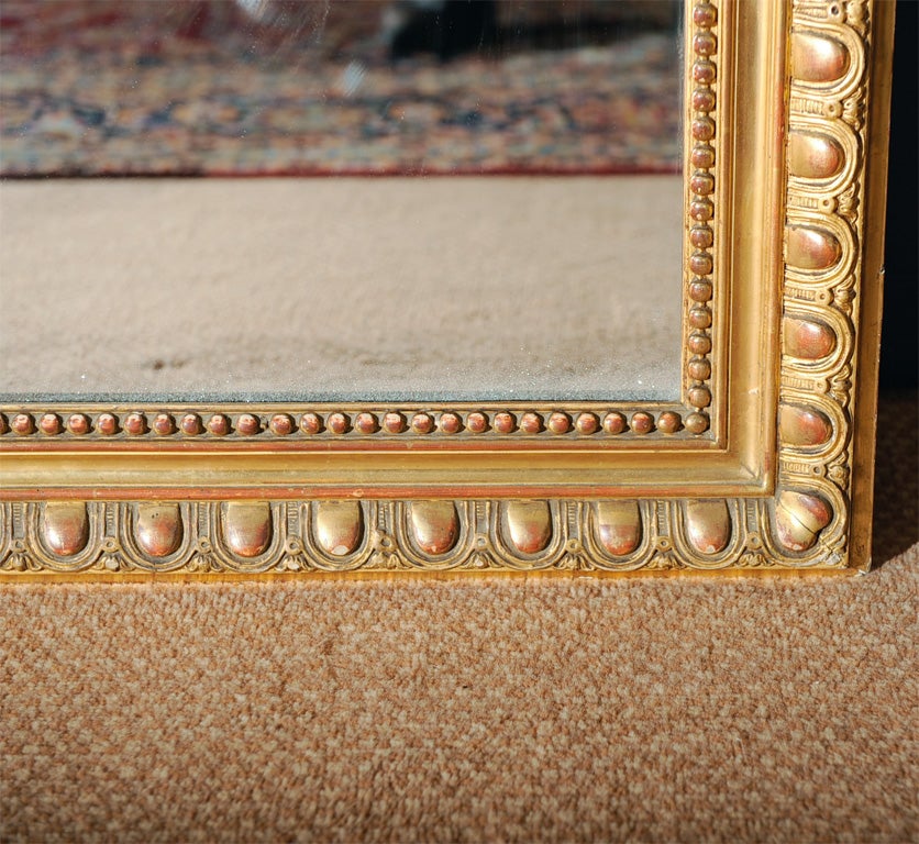Wood French Regence style gilt gesso mirror