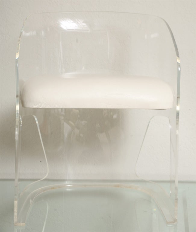 This set of six Kagan lucite chairs are wonderfully versatlie, and - important to any room with a view - nearly invisible. Vintage 70's , but in very impressive condition.