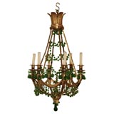 A FRENCH EMPIRE STYLE BRONZE WITH GREEN CRYSTAL CHANDELIER