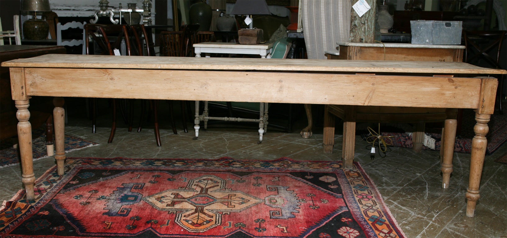 Rustic French farm table with scrubbed top and turned legs.  Can be used for dining or kitchen table.  Also great as sofa table, console or buffet sideboard.