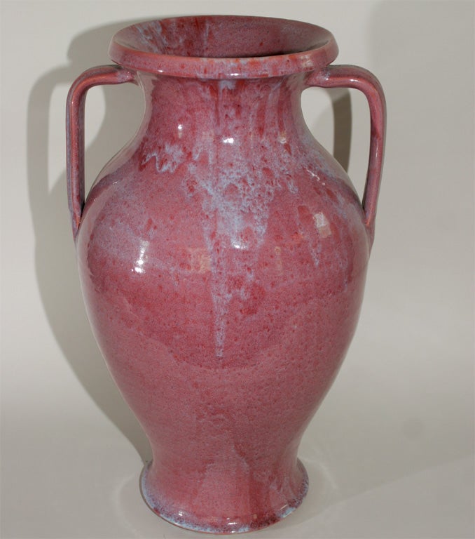 Striking North Carolina hand thrown art pottery vase with exceptional raspberry and blue mottled flambe glaze. Similar forms often attributed to Waymon Cole.