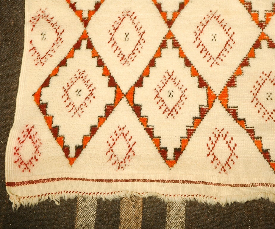Tribal Moroccan Berber pile wool rug from the 1960s.