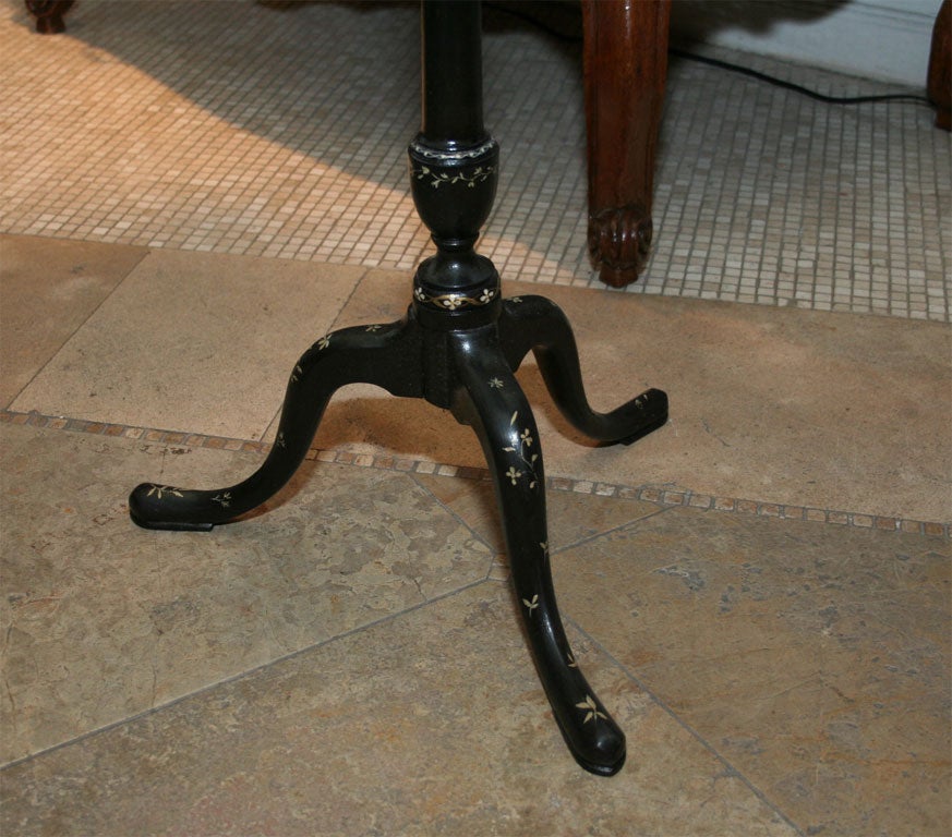 Unusual Queen Ann cut corner candlestand decorated with penwork on an extended urn form shaft.