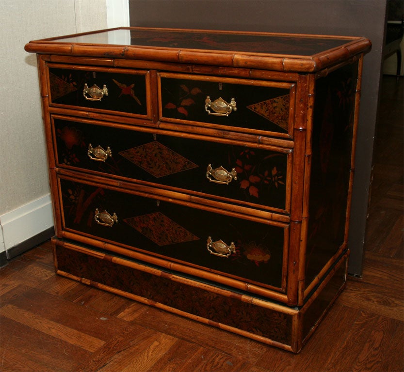 Victorian Bamboo and Lacquered Four Drawer Chest with Original Brass Hardware, Late 19th Century (Newly Restored Lacquered Panels)<br />
<br />
36 inches long x 17.5 inches deep x 31.5 inches high
