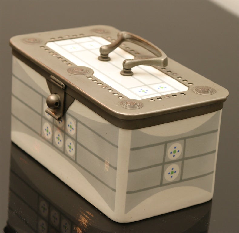 Austrian secessionist ceramic and nickel plated copper box;<br />
designed by PETER BEHRENS.<br />
Ceramic by 