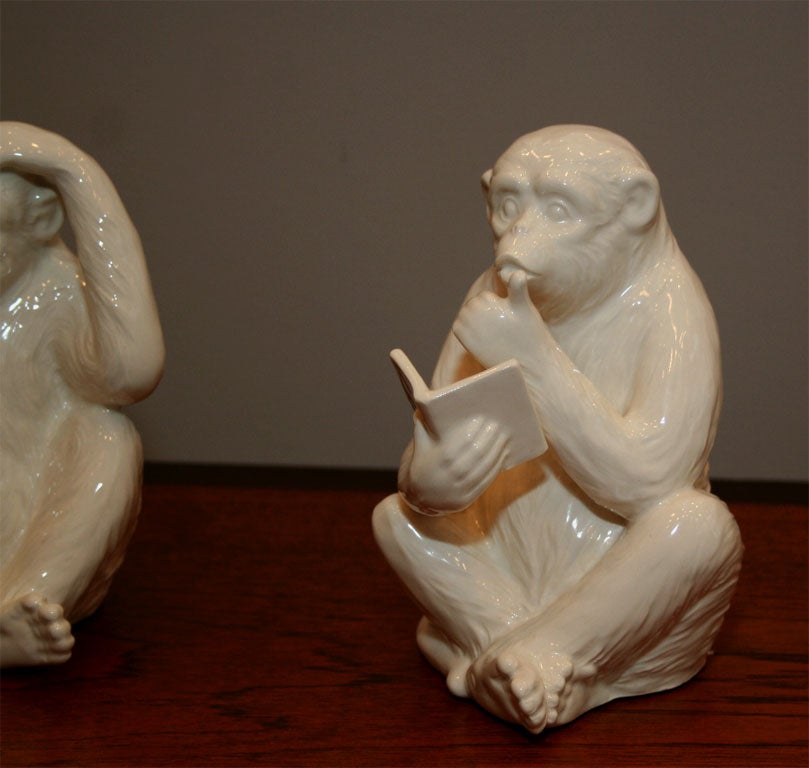 Pair of Ivory porcelain monkeys reading books. Original paper F&F labels, also marked and dated