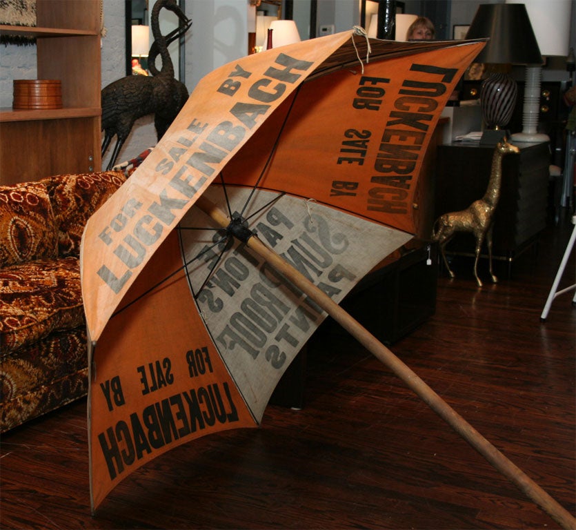 Canvas and wood shaft umbrella from the Lukenbach store in Oconto, Wisconsin