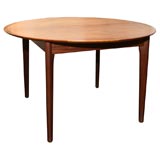 Round Teak Dining Table with Two Leaves