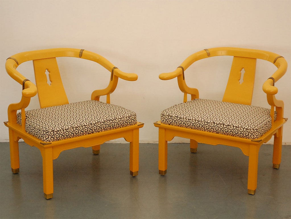James Mont style asian chairs lacquered bright yellow and upholstered in black white wool.  Great Hollywood Regency style.