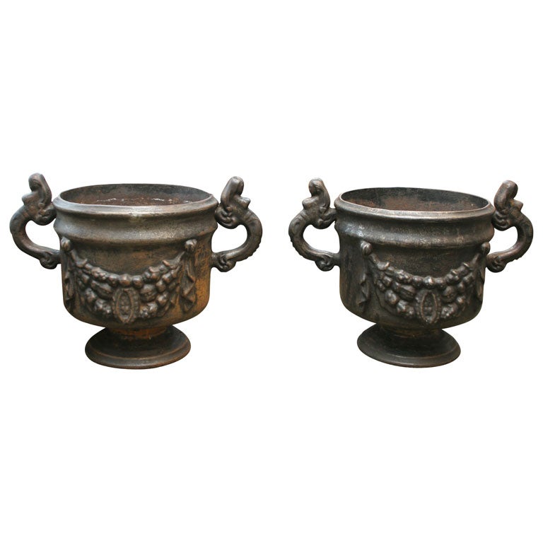 Pair of Ornate Cast Iron Urns For Sale