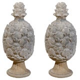 Pair hand carved garden ornament in the shape of a pineapple