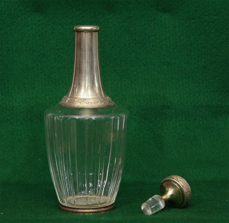 A SET OF FOUR CARAFES ON A MIRRORED PLATEAU,  C. 1850 1