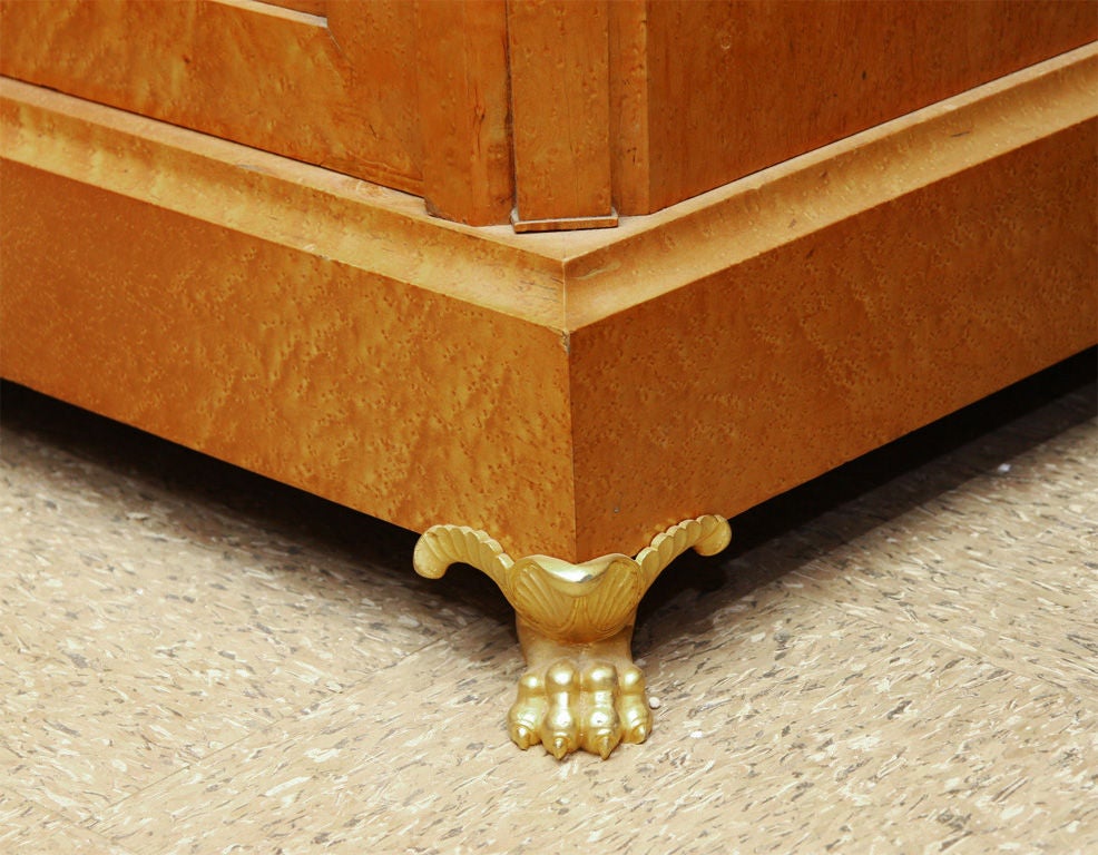 AN EMPIRE STYLE BOOKCASE-CABINET. EARLY 20th CENTURY