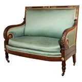 Antique French Louis Philippe settee. Mahogany and gold leaf