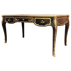 A LOUIS XV STYLE BUREAU PLAT. PROBABLY FRENCH, 20th CENTURY