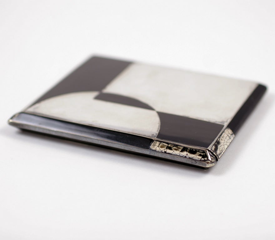 Pure Art Deco graphic design in black enamel and eggshell Cigarette Case attributed to Raymond Templier.  Numbers and touchmarks on interior of case.  Please note that image #4 shows 2 spots which are reflections from photographer's lighting, and