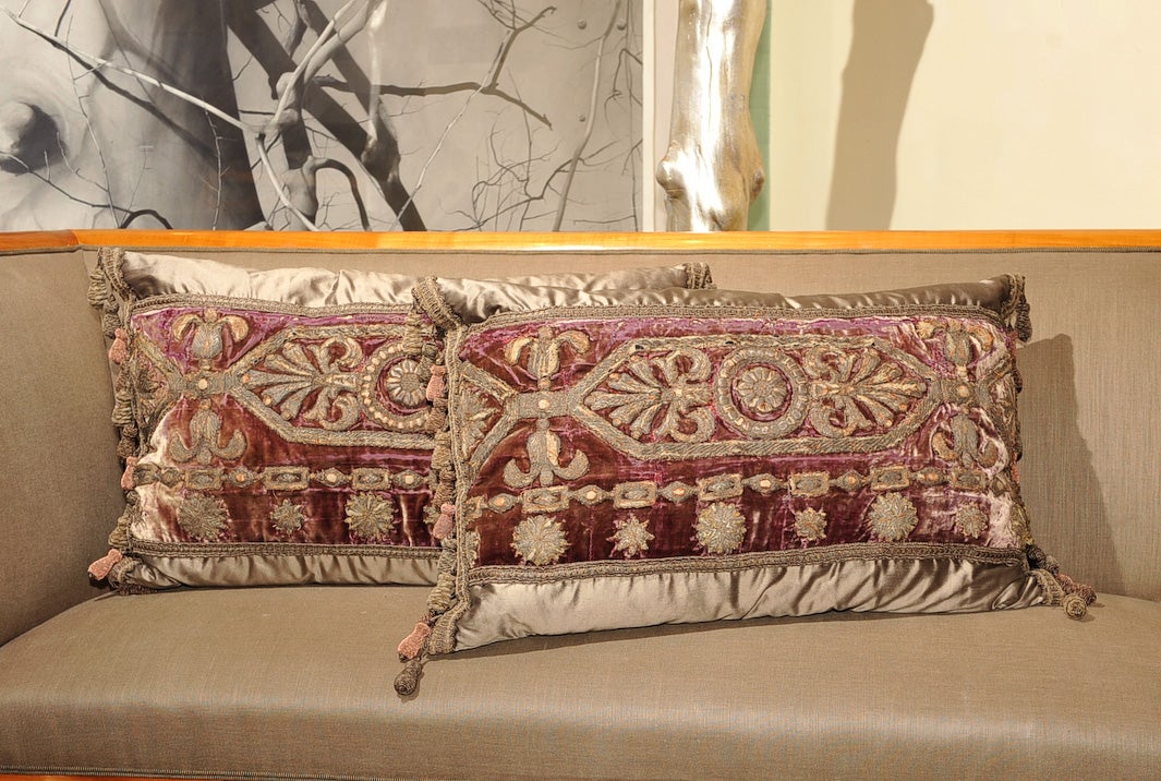 Pair of 18th Century French Silk Velvet and Embroidered Pillows with Rosettes, Central Fleurettes and Acanthus Leaves all Composed of Pewter Threads Trimmed in 19th Century Woven Silver Tape with Contrasting Silk Wrapped Side Tassles; Pewter Silk