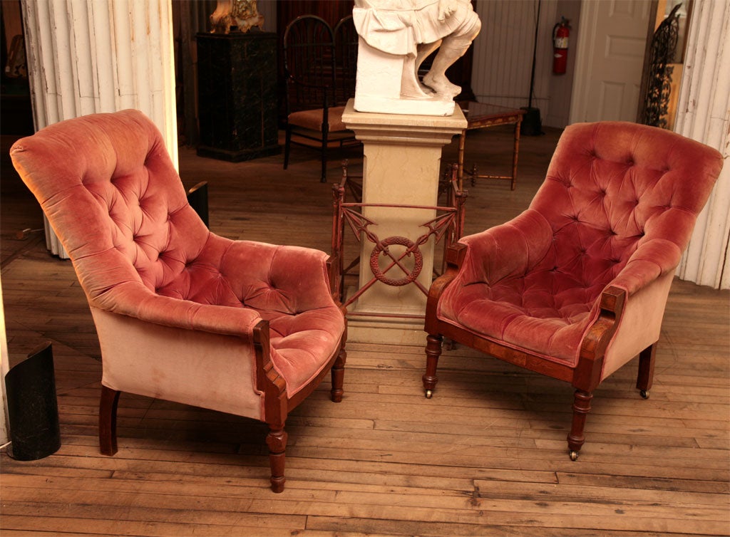 pair of chairs made famous by Washington Irving<br />
therefore dubbed Sleepy Hollow Chairs<br />
each one is a bit different including seating comfort<br />
tufted in a wonderfully sun faded short nap velvet<br />
detail decoration on sunfaded