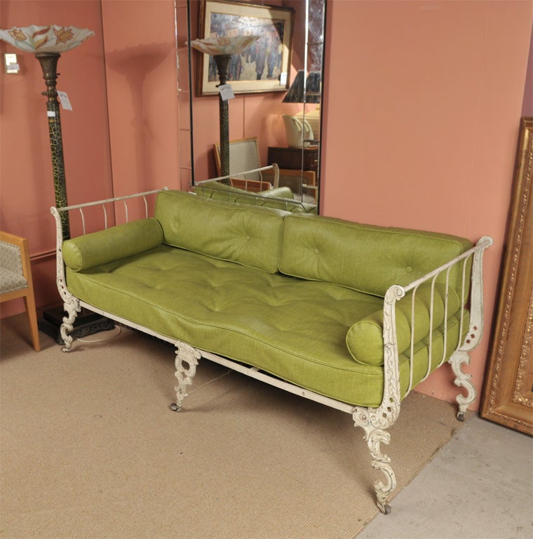 Fantastic 1940's Day bed in wrought iron with green vinyl custions.