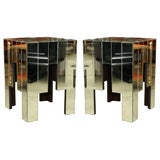 A pair of mirrored sofa end tables