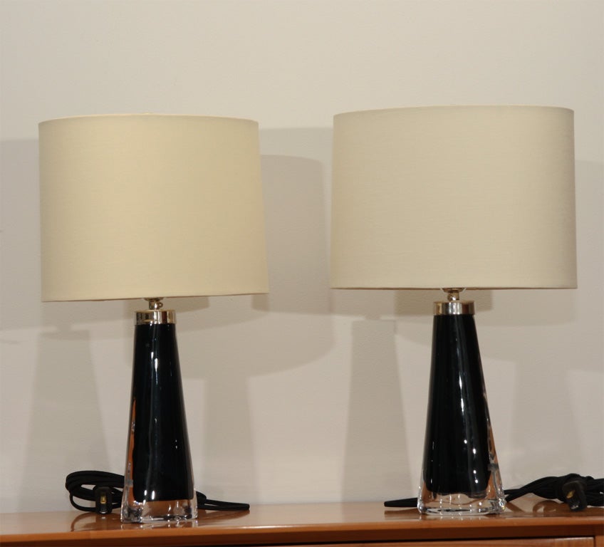 Pair of glass Lamps by Orrefors. <br />
Signed