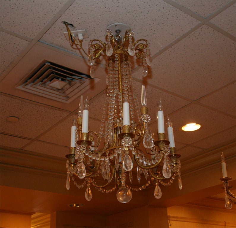 GILDED BRONZE 8 ARM LOUIE XVI STYLE CHANDELIER WITH ROCK CRYSTAL