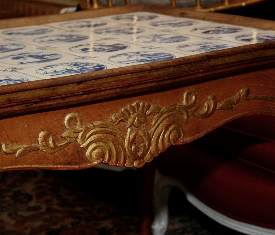 19th Century Swedish Rococo carved oak table with Dutch Delft tile