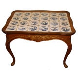 Swedish Rococo carved oak table with Dutch Delft tile