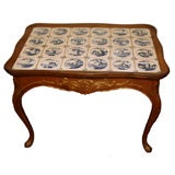 Swedish Rococo carved oak table with Dutch Delft tile