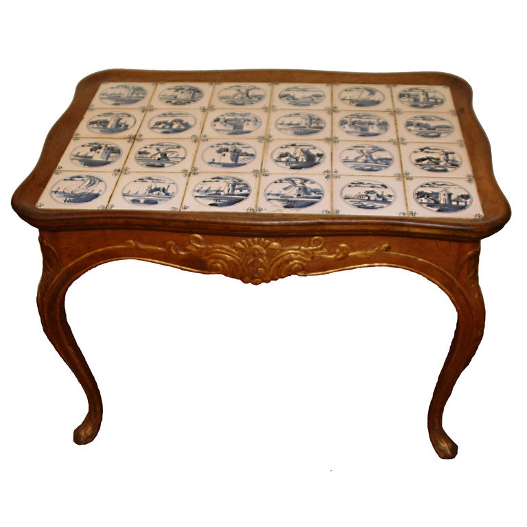 Swedish Rococo carved oak table with Dutch Delft tile