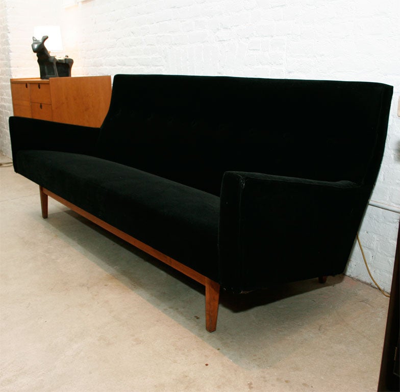 Classic Jens Risom button backed sofa on walnut base