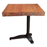 Used side table with ironing board cast iron base