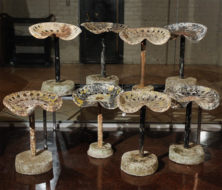 Whimsical collection of tractor seat stools