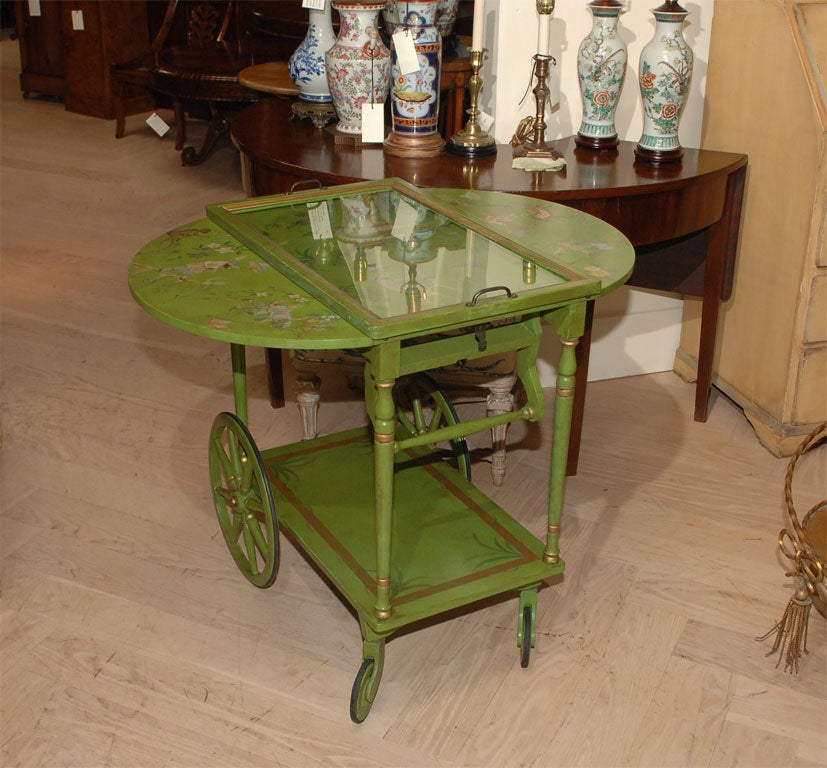 A very nice tea or drinks cart with removable serving tray.  Recently painted with fanciful chinoiserie scenes.