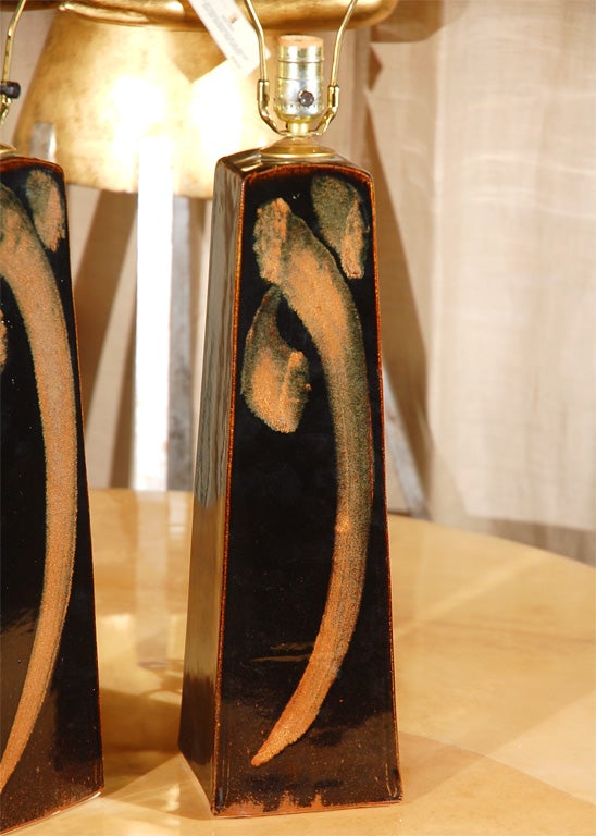 Pair of hand-painted with glaze finish on ceramic table lamps.