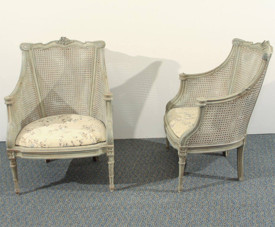 Pair of Wanut French Caned Bergeres