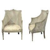 Pair of Wanut French Caned Bergeres