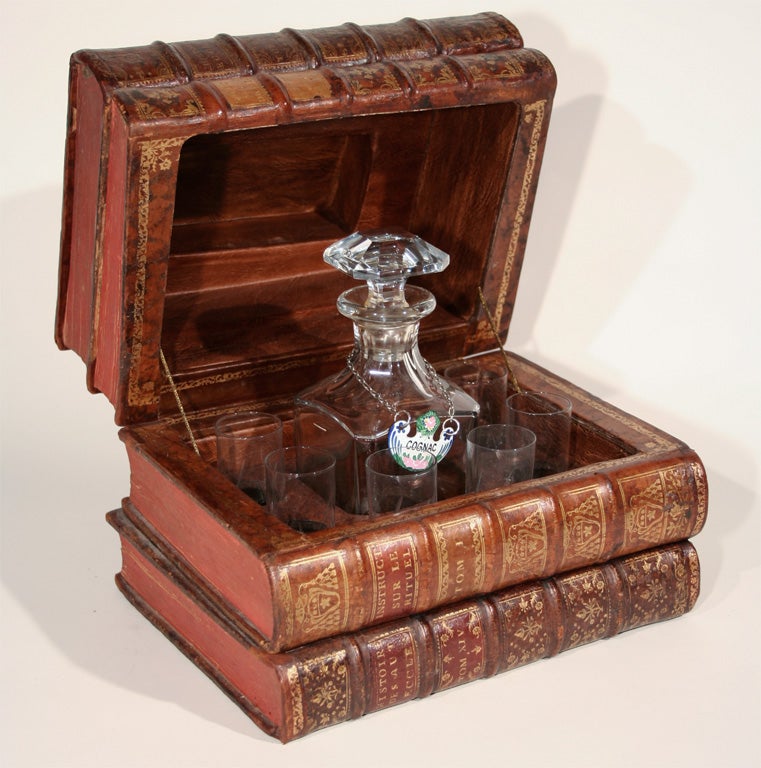 An Early 20th Century Faux Book Box Opening to Reveal Interior Liquor Carafe and Glasses