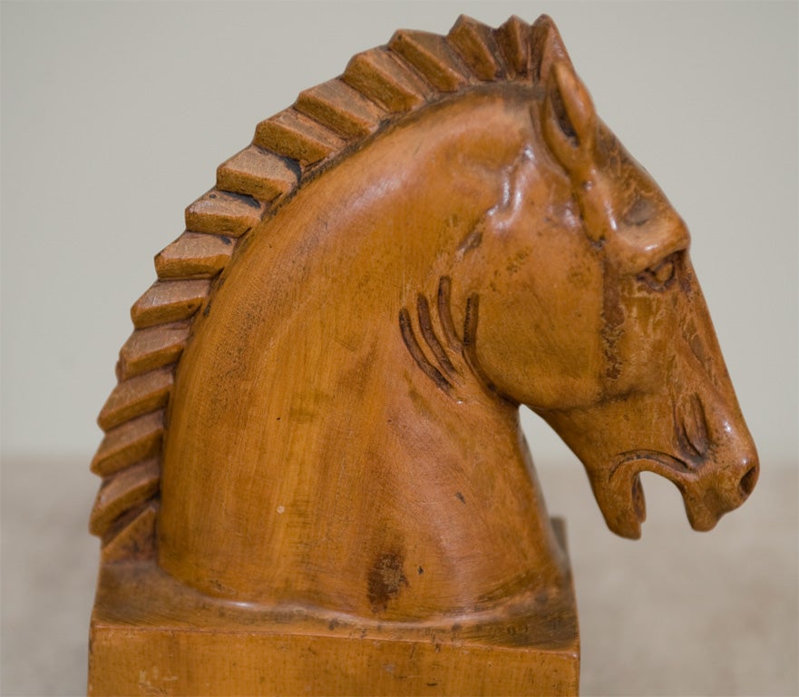 A Pair of Fruitwood Carved Horse Bookends 1