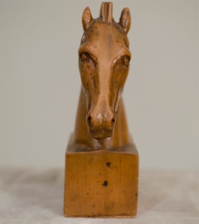 A Pair of Fruitwood Carved Horse Bookends 2