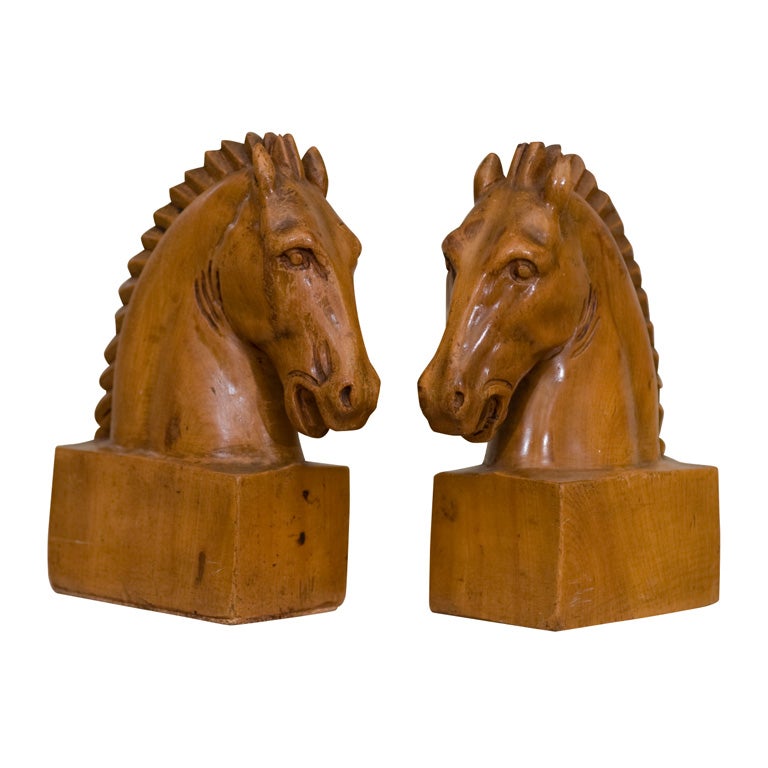 A Pair of Fruitwood Carved Horse Bookends