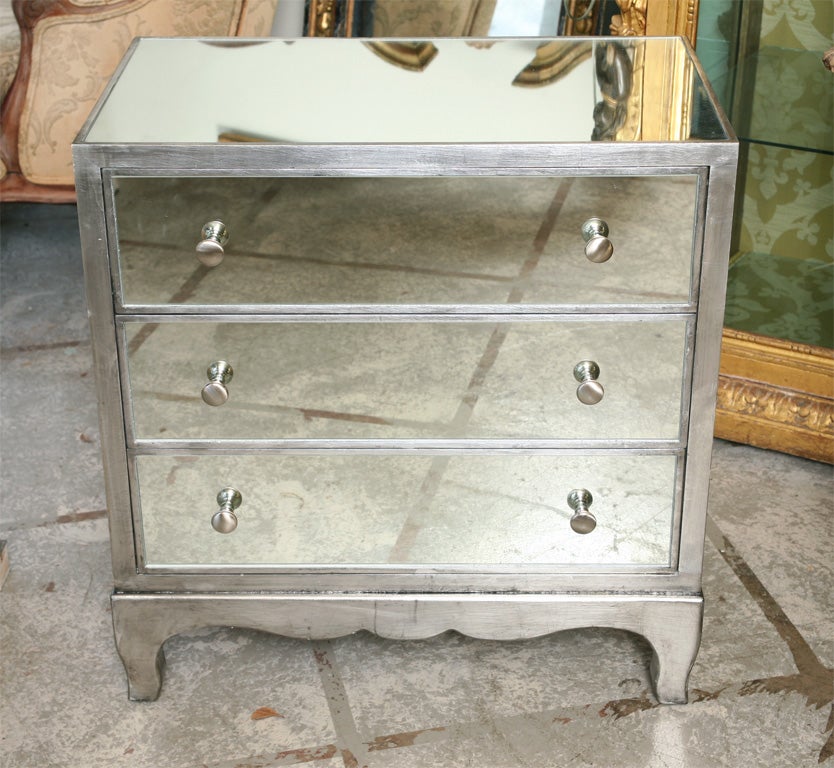 Three-drawer mirrored chest.

Created and design by Coco House and company.