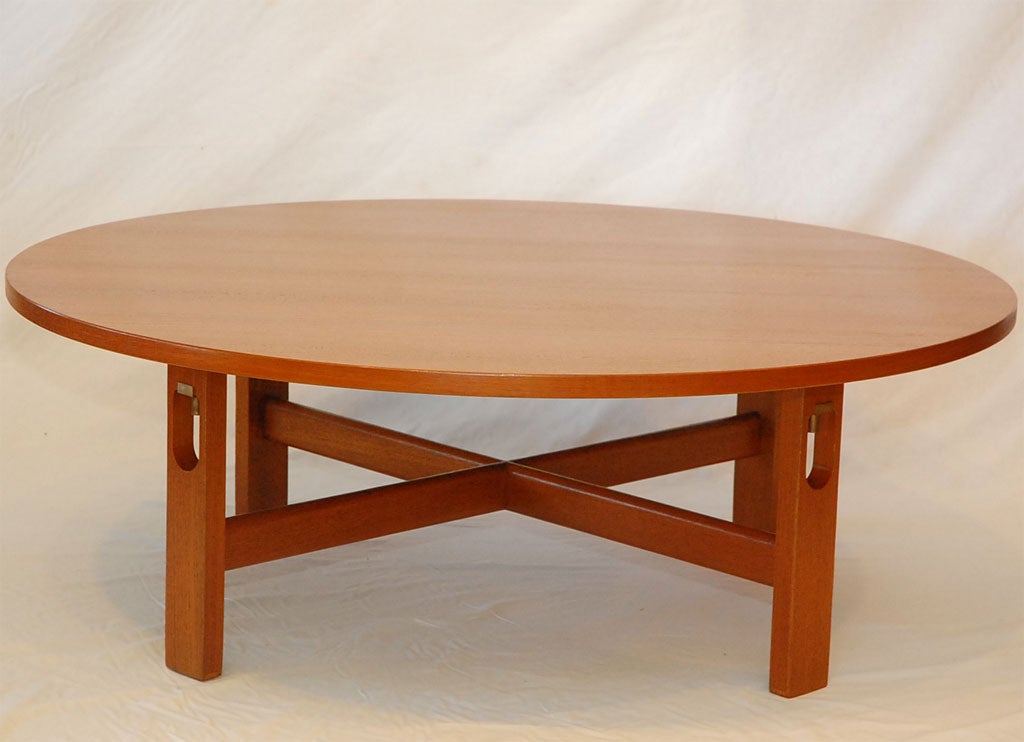 Round coffee table designed by Hans Wegner and produced by Getama