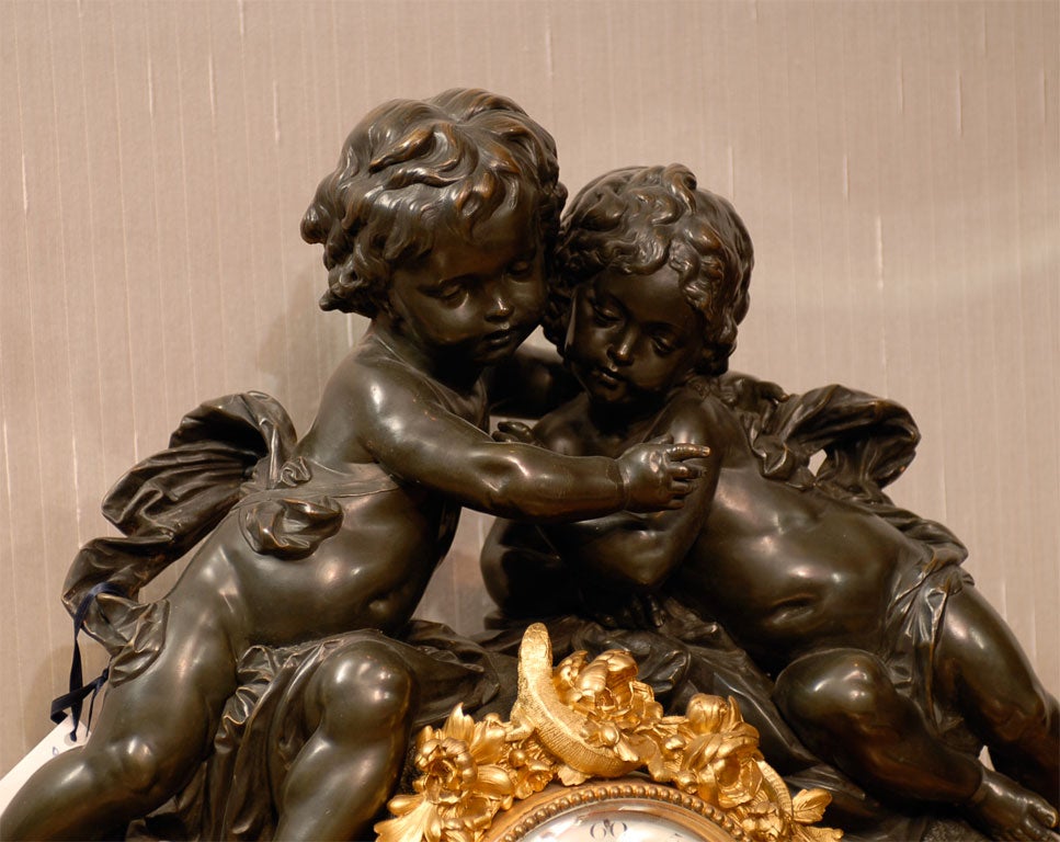 French Clock in Gilt and Patinated Bronze with Two Cherubs In Excellent Condition For Sale In Atlanta, GA